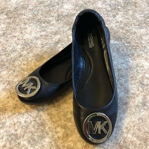 Black MK flats